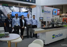 The team at Sinclair with the labelling machine.